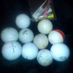 Golf ball lot of 13 with tees